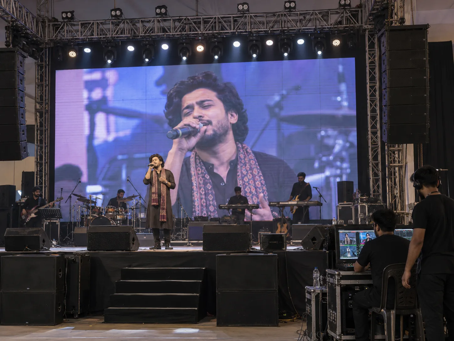 Event production team operating a rental LED stage during a live performance